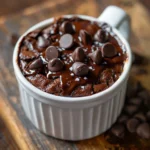 Cottage Cheese Brownie Mug Cake with melted chocolate chips